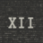 XII